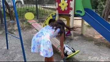Teen girl swings and pisses in public
