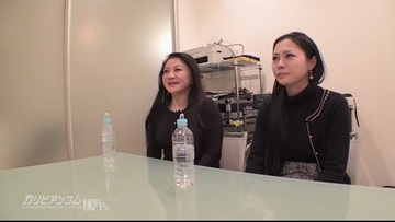 Two Asian brunettes sucking a small cock
