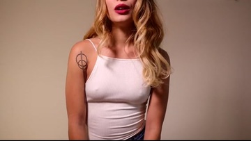 She fucks herself with a dildo, in her mouth and pussy.